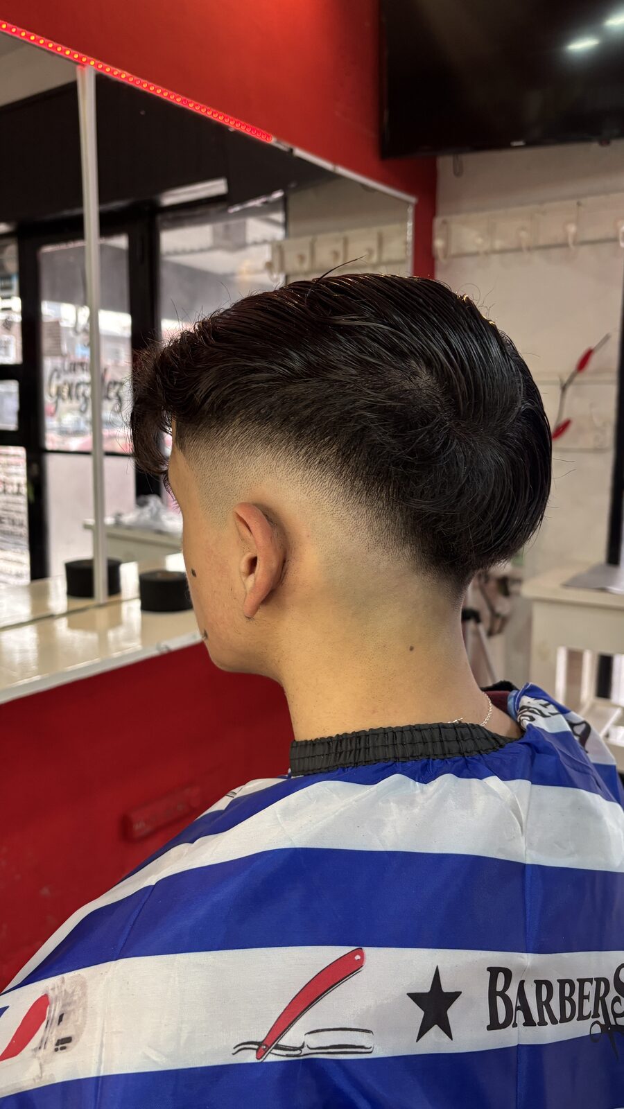 Detalle de degradé realizado por un alumno de barbería